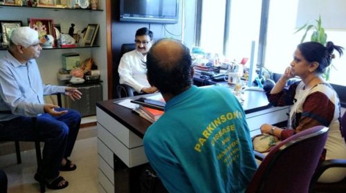 Dr. Paresh Doshi consulting a patient Dr. Paresh Doshi consulting a patient